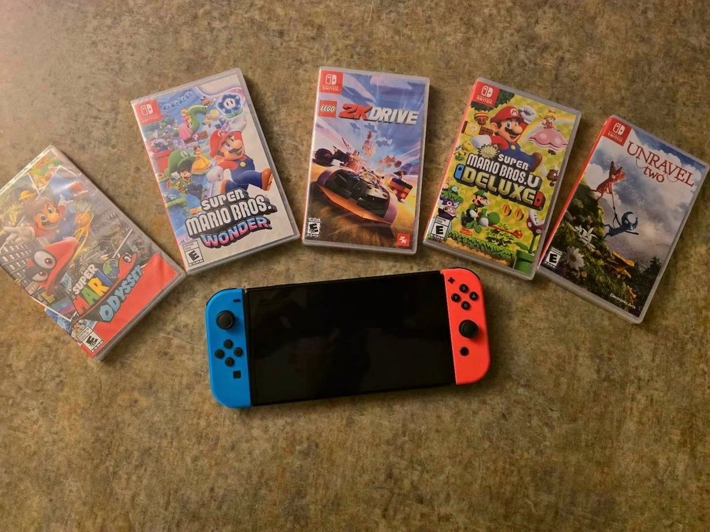 Nintendo Switch OLED Console with 5 Sealed Games Used - Unlocked
