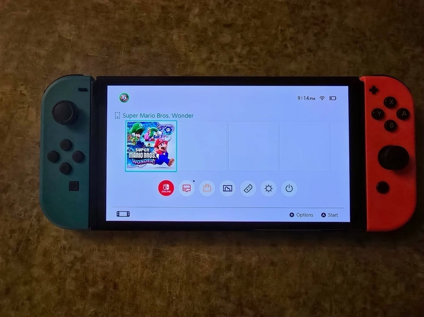 Nintendo Switch OLED Console with 5 Sealed Games Used - Unlocked image 3