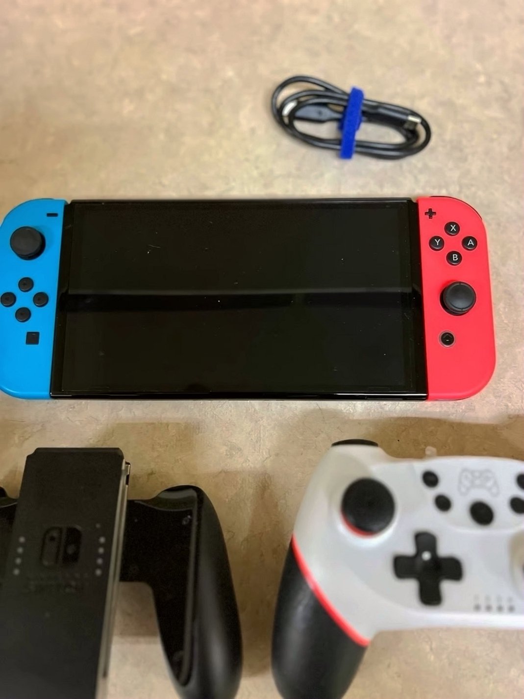 Nintendo Switch OLED with 2 Wireless Controllers - Used image 4
