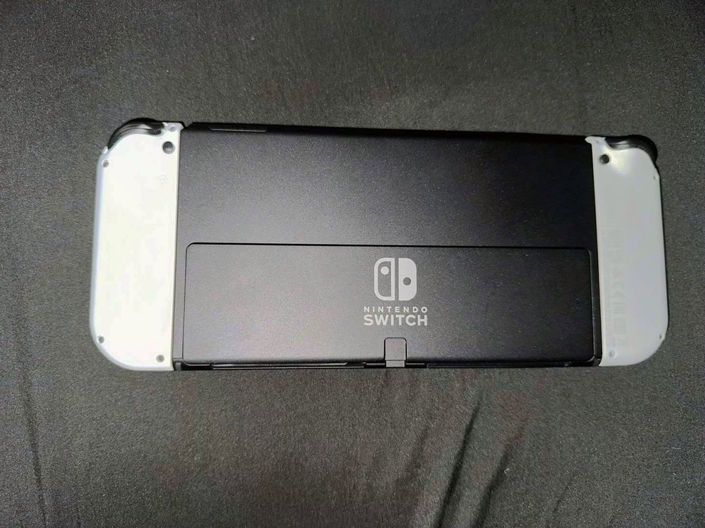 Nintendo Switch OLED White with Mario Strikers & Ring Fit Adventure - Used image 2