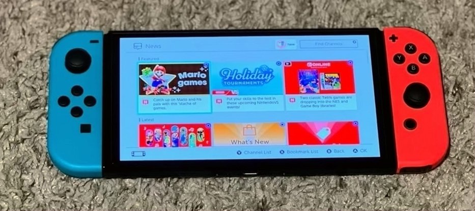 Nintendo Switch OLED 64GB Red & Blue Gently Used