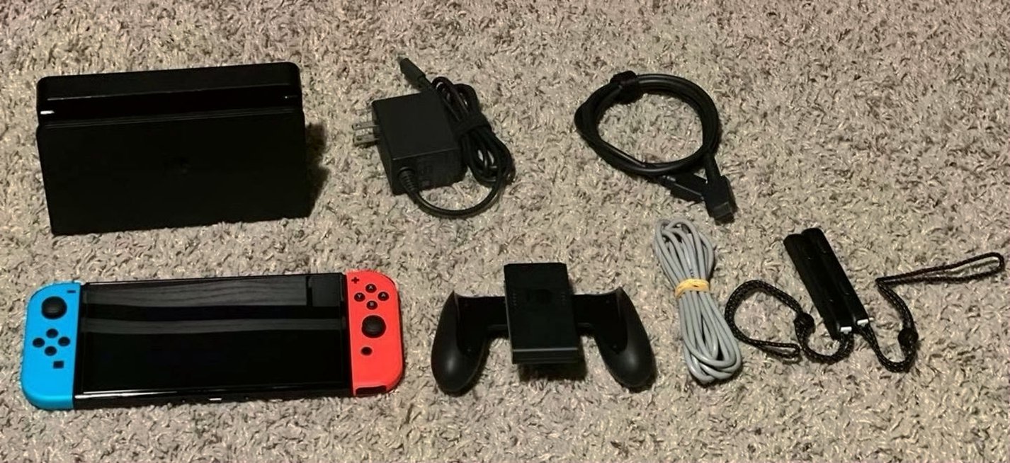 Nintendo Switch OLED 64GB Red & Blue Gently Used image 2