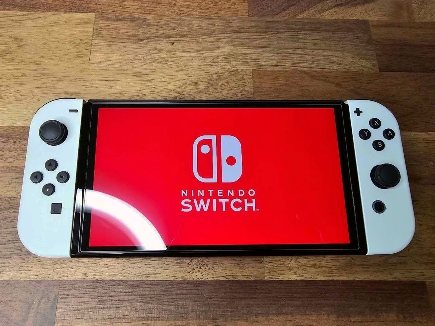 Nintendo Switch OLED 64GB White with 128GB SD Card & 5 Games - Used image 4