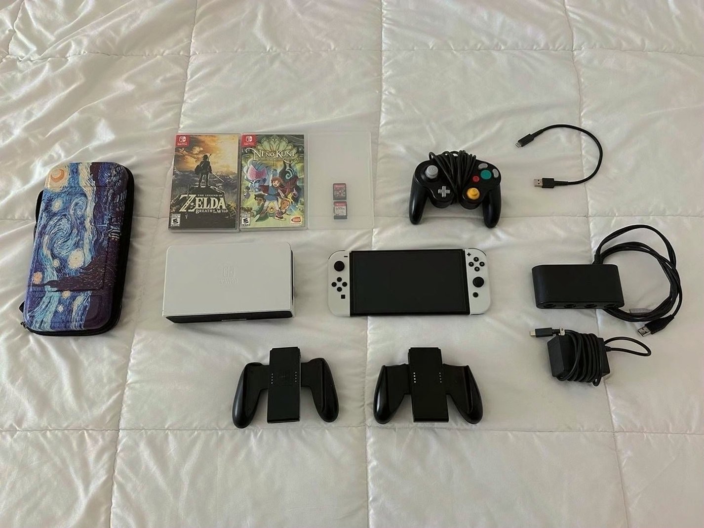 Nintendo Switch OLED 55GB Black Used - Includes Accessories and 4 Games