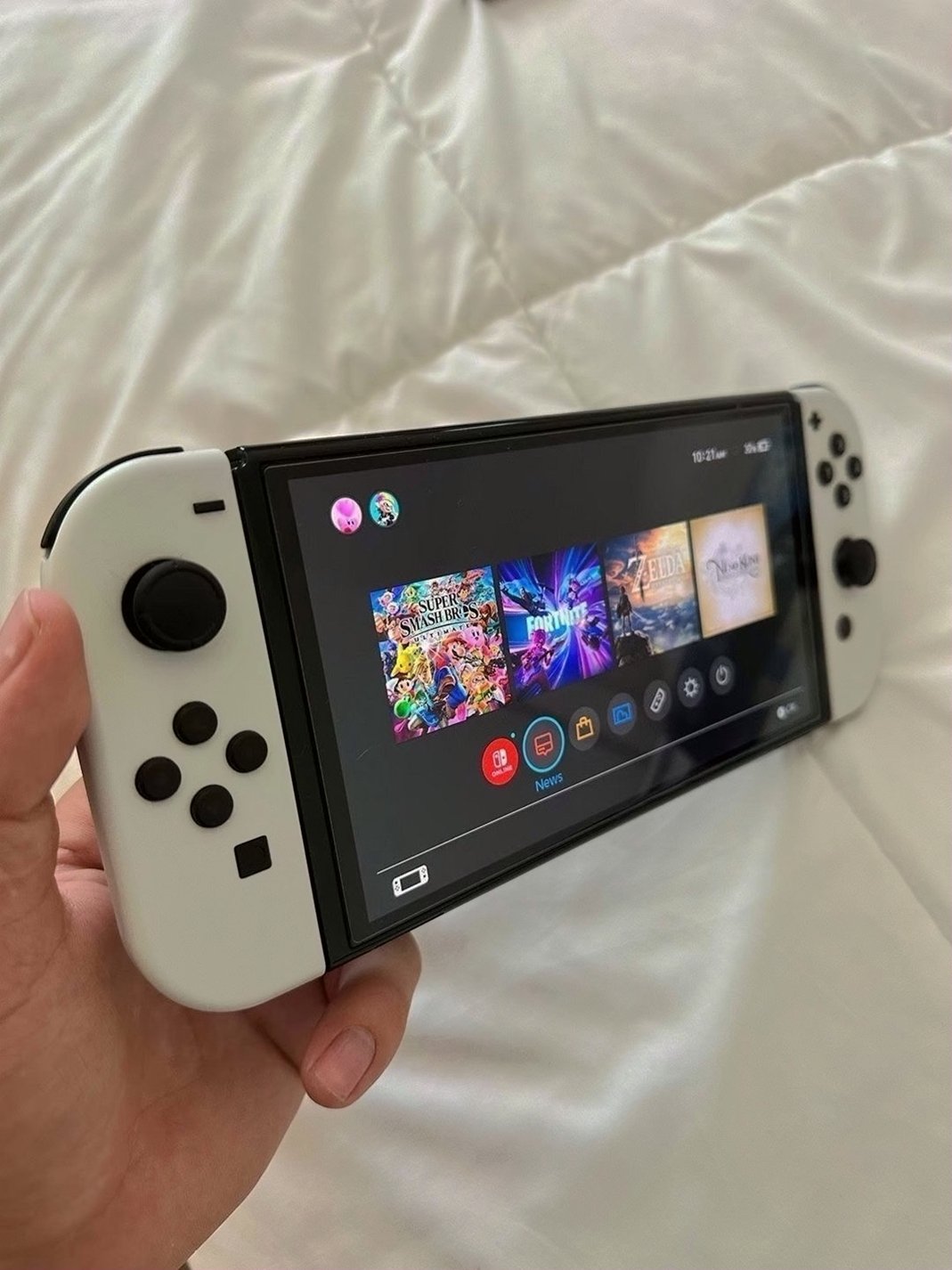 Nintendo Switch OLED 55GB Black Used - Includes Accessories and 4 Games image 2