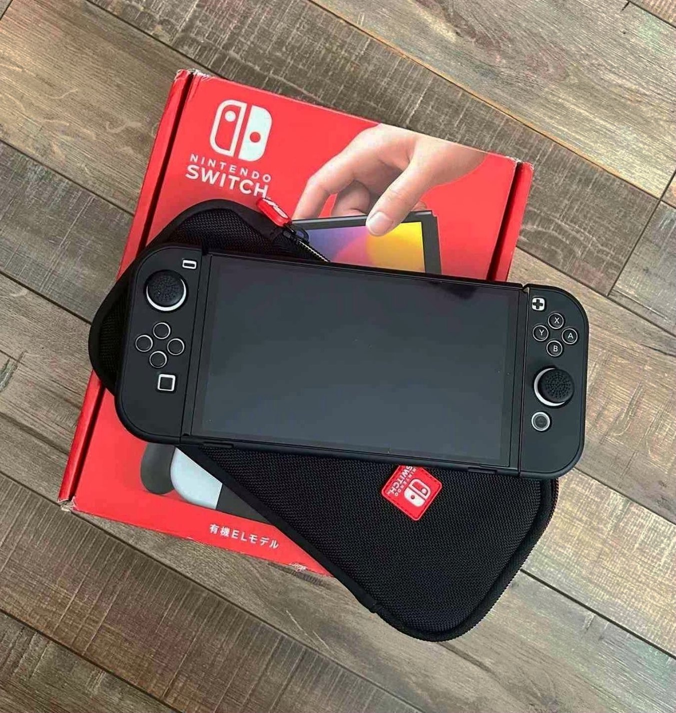 Nintendo Switch OLED 9T38 with Protective Case - Used