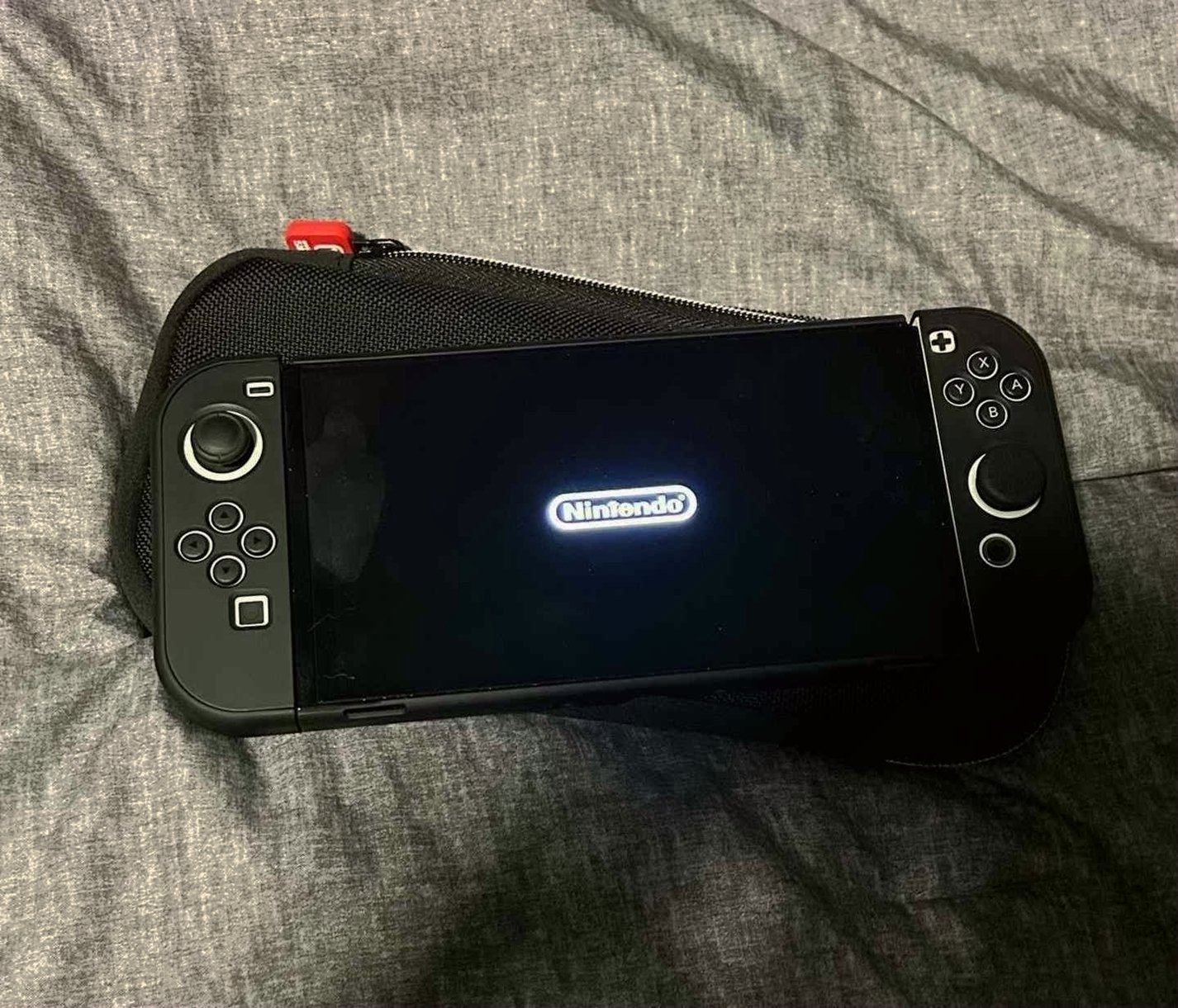 Nintendo Switch OLED 9T38 with Protective Case - Used image 4