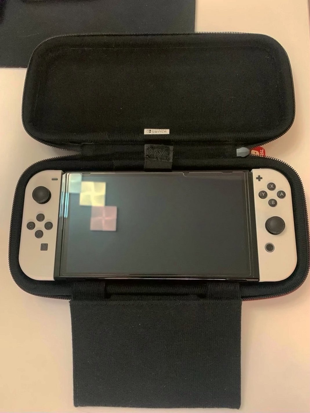 Nintendo Switch OLED Console 64GB Neon Red/Blue Unlocked - Used image 3