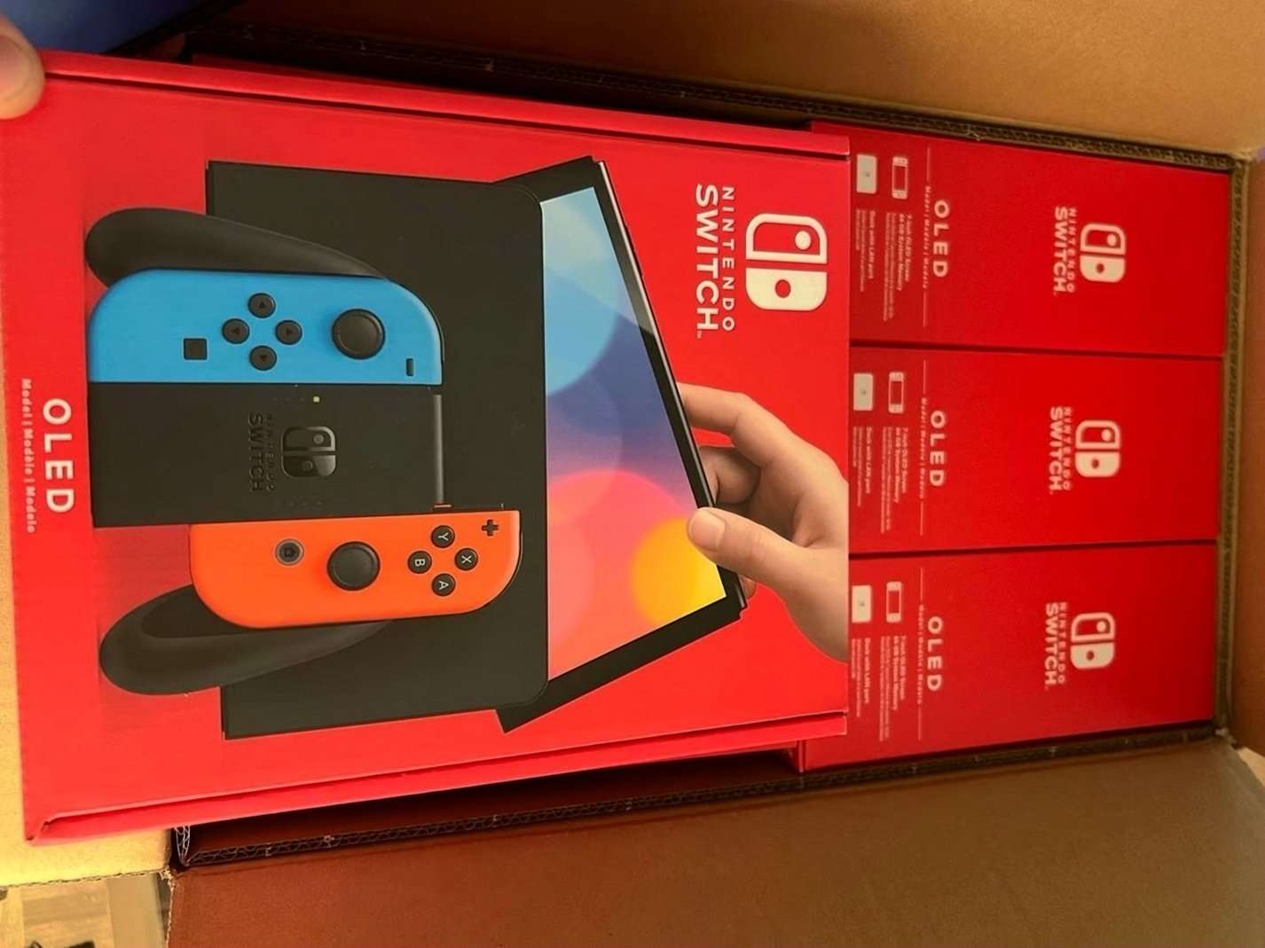 Nintendo Switch OLED Console with 4 Games Used - Unlocked