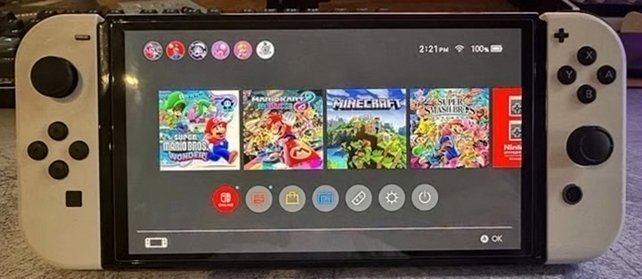Nintendo Switch OLED Bundle 64GB White Used image 3