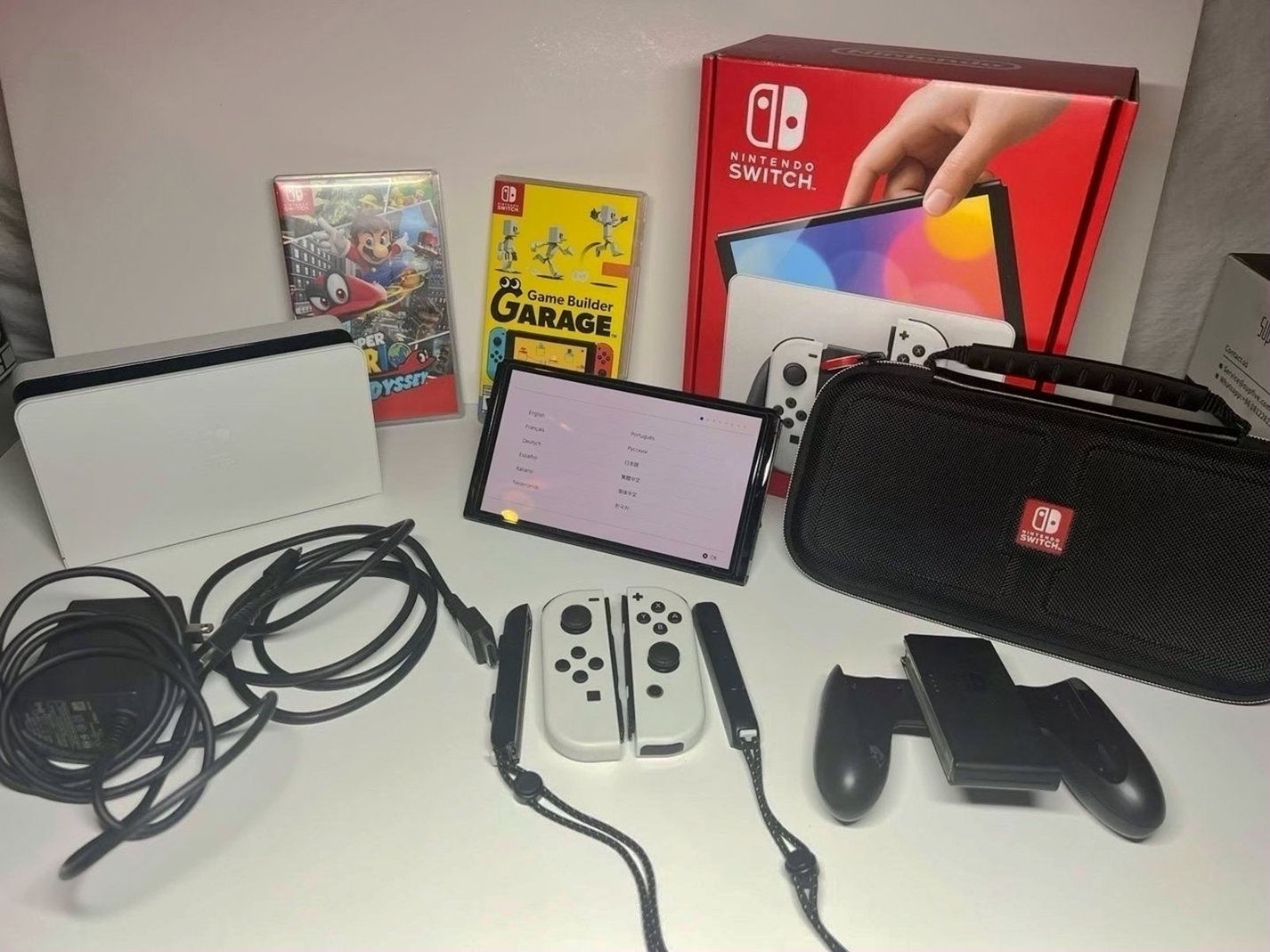Nintendo Switch OLED 5C52 with Mario Odyssey and Game Builder Garage - Used