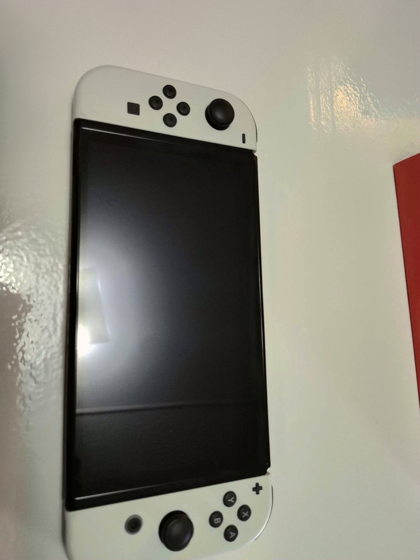 Nintendo Switch OLED 7S58 Used - Unlocked image 3