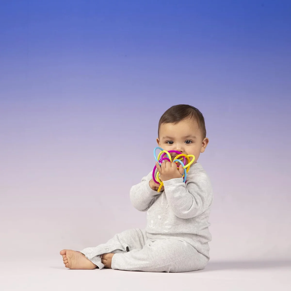 Manhattan Toy Winkel Rattle & Sensory Teether Toy Model 200930 BPA-Free Blue/Green/Orange New image 4